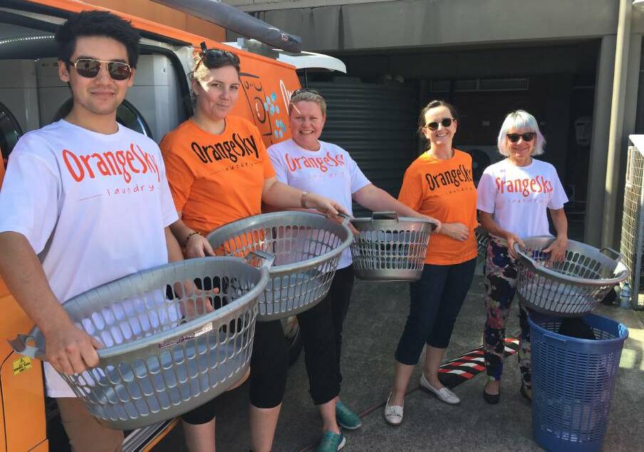 Orange Sky Laundry volunteers have been hard at work in Laurieton helping people in need receive a vital service. 