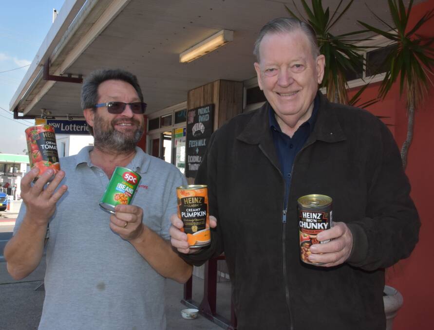 Community donations: Steffan Andler and Theo Hazelgrove want residents to get on board with dropping off non perishable food items to the Kew Corner Store. 