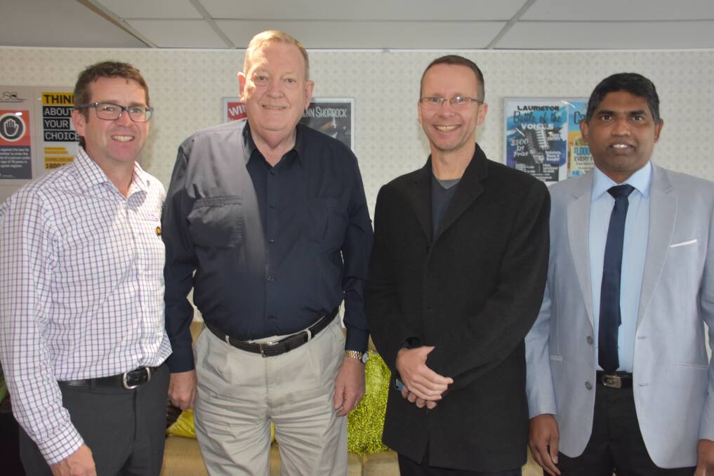 United front: Laurieton United Services Club manager Rob Dwyer, Camden Haven Community @ 3 chairperson Theo Hazelgrove, Camden Haven Anglican Church Reverend Nathan Killick, Doctor Samuel Nelapati