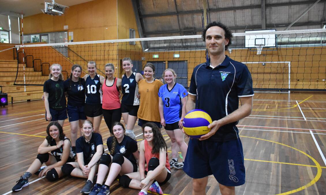 Todd Dalton pictured with keen volleyball players from Camden Haven High School. 