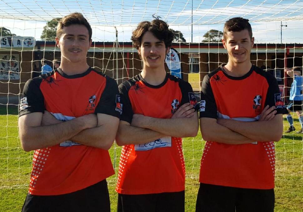 Prepared: Camden Haven Redbacks players Ben Makin, Lochie Swan and Jeremy Robinson are ready to play for the Football Mid North Coast team against the Jets.