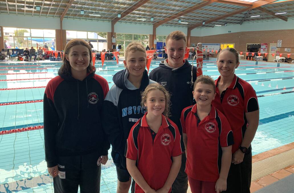 Strong crew: Members of Laurieton Swimming Club at the championships.