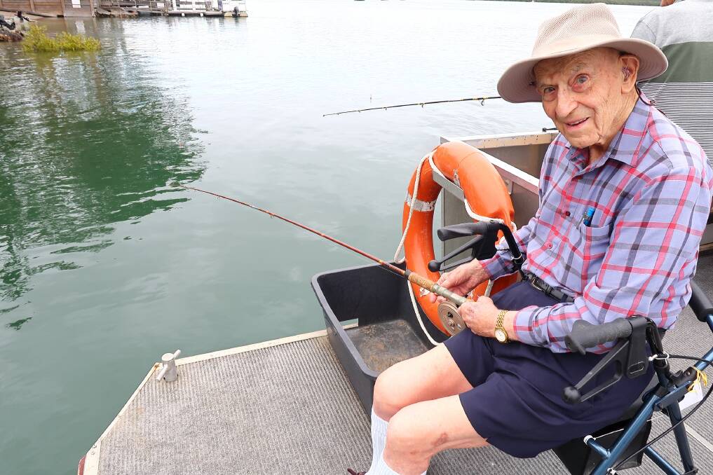A wish come true: Ron Walesby, 99, was able to drop a line for black fish thanks to Garden Village's Dream Weaving program.