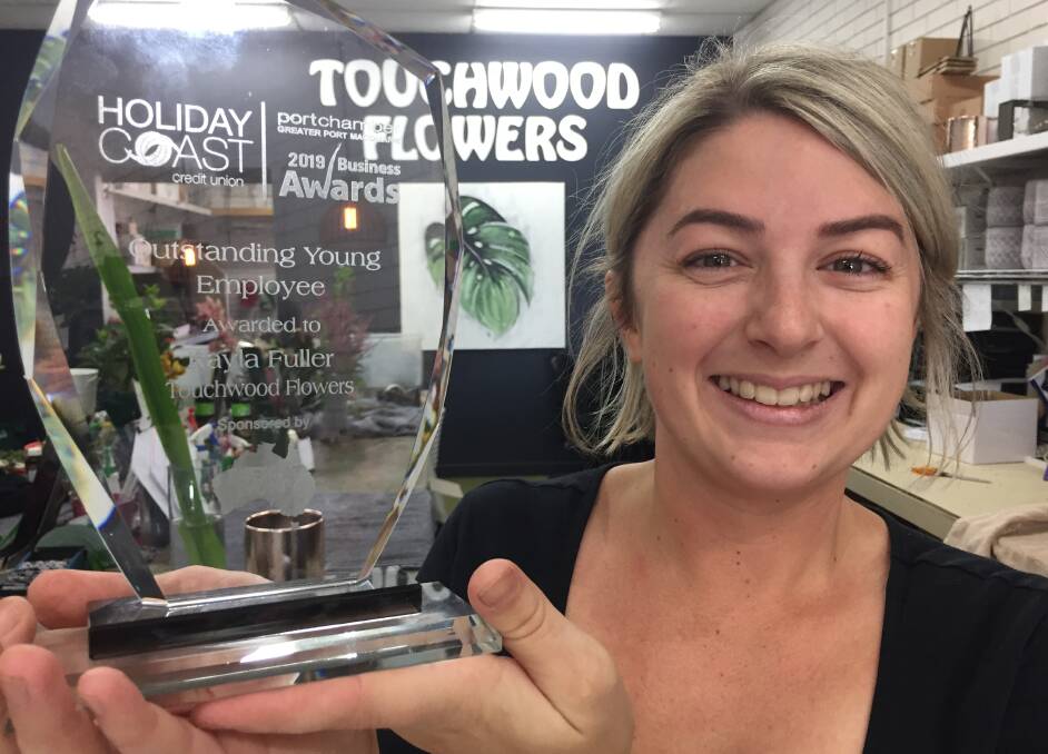 Big boost: Port Macquarie's Kayla Fuller is the winner of the outstanding young employee award.