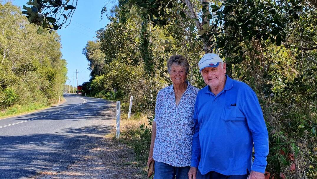 Generous donation: Elaine and Paul Southon on the stretch of land their son Steve has donated to council for the next phase of the Beach to Beach pathway project at Dunbogan.