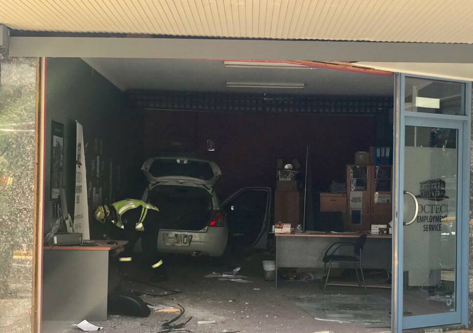 Bold Street drama: The car came to rest inside the OCTEC business on Bold Street, Laurieton. Photo: Jessie Johnson.
