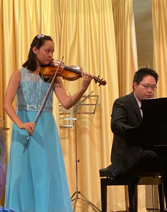 Teresa Yang is only 14 years old and played brilliantly. She was accompanied by pianist Alexander Yau.