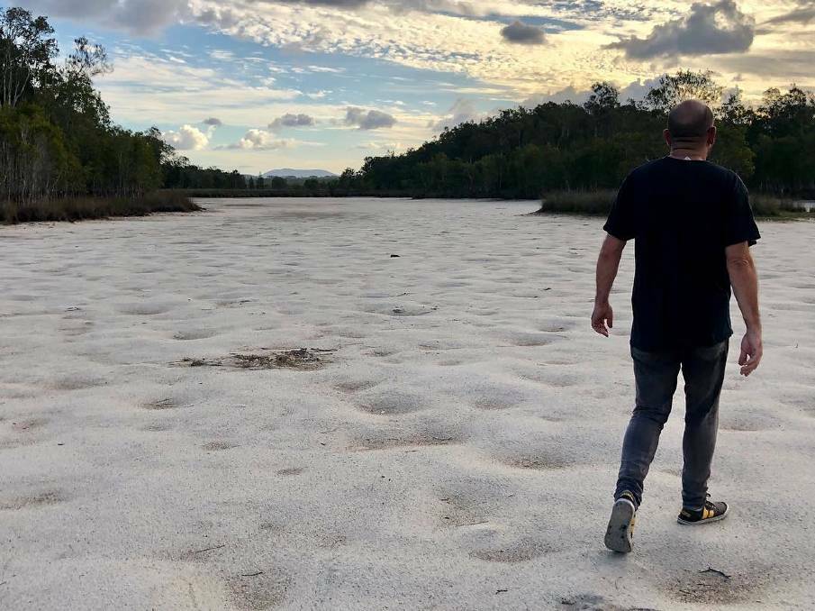 
 Empty: A dry lake bed at Lake Cathie has residents concerned. Photo: Lisa Willows.