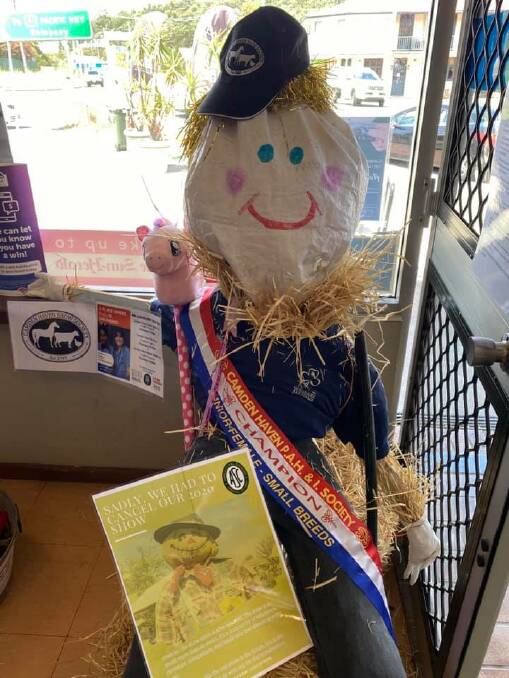 STRAW TRIBUTE: A scarecrow on display at Kew Corner Store. Photo: Supplied/Camden Haven Show Society.