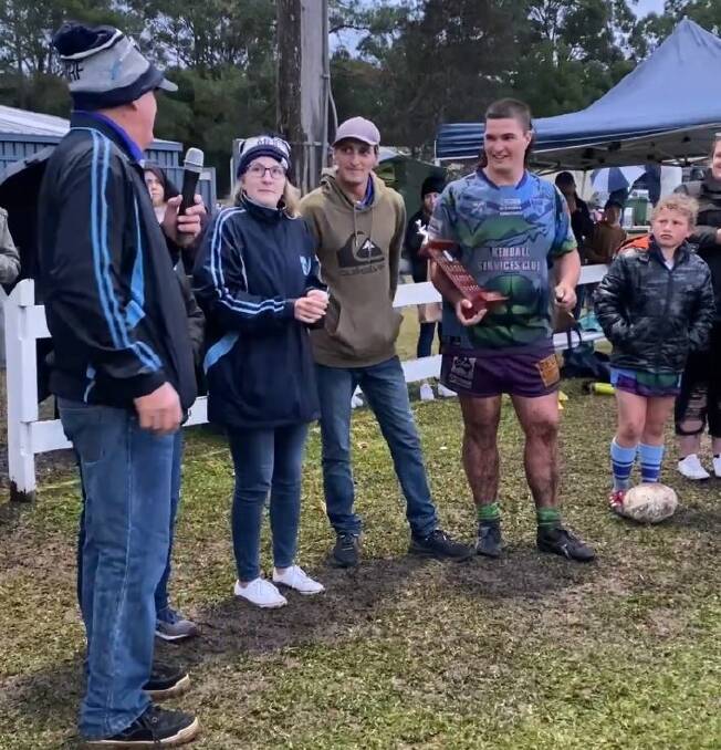WIN: Kendall Blues man of the match, Riley Opdam accepting the trophy on Saturday against Comboyne Tigers. Photo: Kendall Blues.