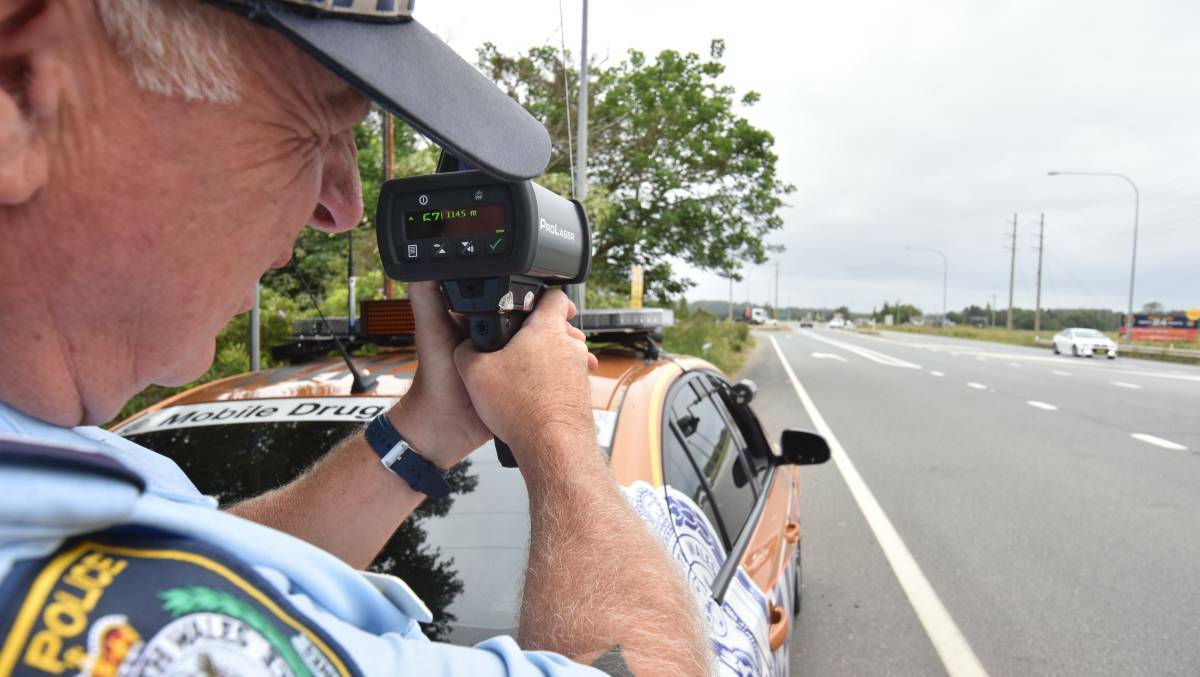 Out and about: Grant Christensen on patrol in Port Macquarie during 2015.