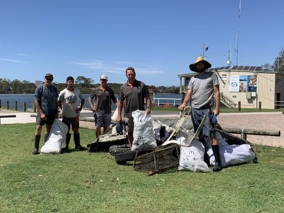 ON A MISSION: Camden Haven oyster farmers at the clean up in 2020. Photo; Supplied.
