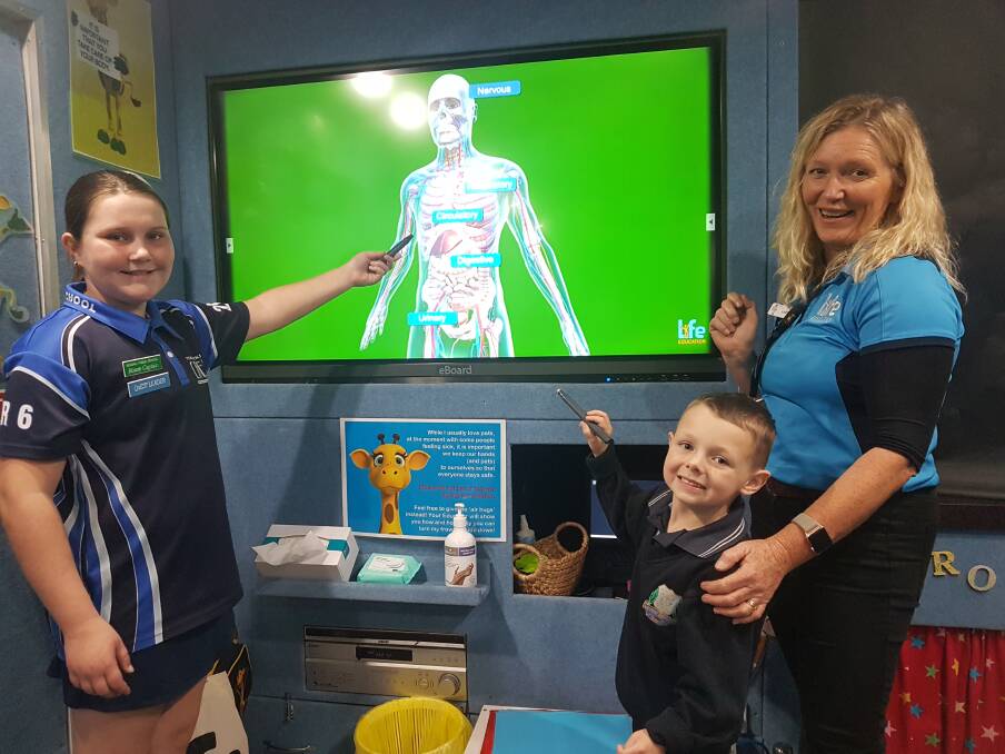HUMAN BODY EDUCATION: Kendall Public School students Lockie N and Lexi H with Leanne Goggin. 