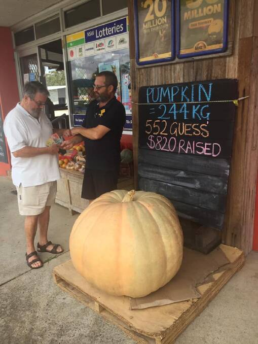 CORRECT GUESS: Kew Corner Store owner Staffan Andler closing the competition by donating proceeds to Camden Haven Community@3. Photo: Community@3.