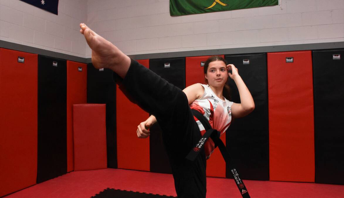 Karate: Port Macquarie martial artist Sascha Arnberger throws a kick at training.