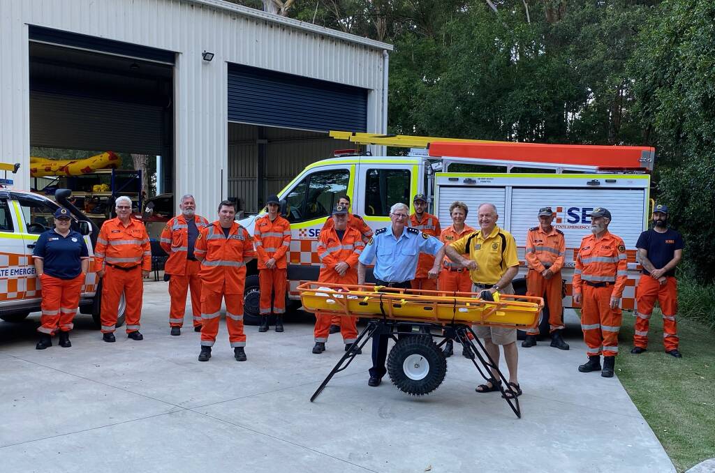 NEW EQUIPMENT: NSW State Emergency Services Camden Haven volunteers with the new vehicles.