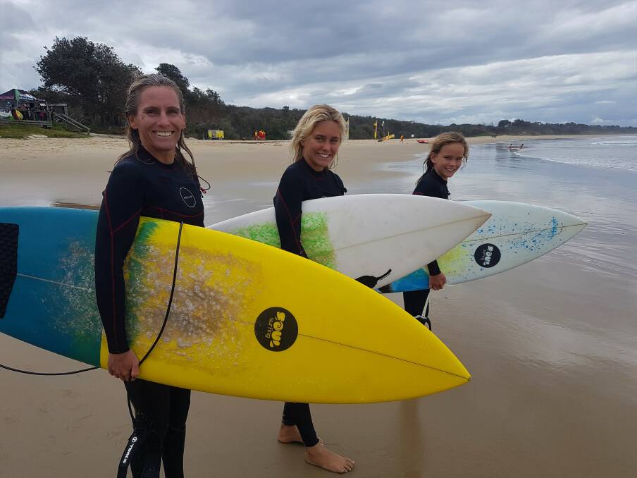 SURFS UP: Lauren, Imogen and Avalon at the Mid North Coast Girls Surf Classic on Rainbow Beach.