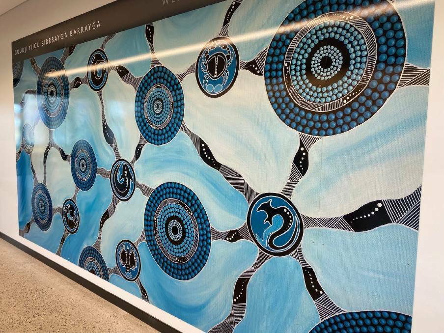 AIRPORT MURAL: A mural commissioned by council from Birrbay artist Angela Marr-Grogan on display at the Port Macquarie Airport.