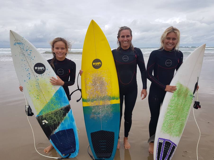 SURFS UP: Avalon, Lauren and Imogen at the Mid North Coast Girls Surf Classic on Rainbow Beach.