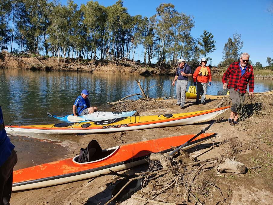 ON THE RIVER: Some of the paddlers ready to launch at Telegraph Point. Photo: Supplied.