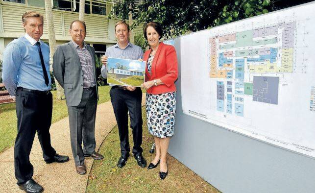 Stewart Dowrick, David Bedingfeld, Alan Pretty and Leslie Williams in February 2017 inspect the schematic design for the expanded mental health unit at Port Macquarie Base Hospital.