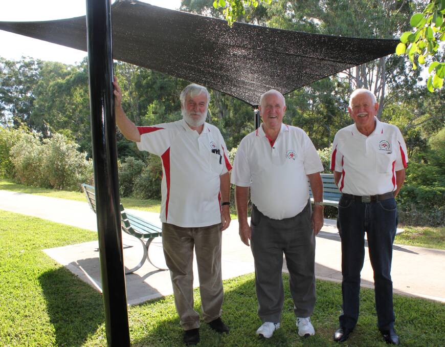 Rest area: Heart Support members Reg Wilkinson, Mike Storrier and Max Heslehurst show off the new shade sail and seats installed along the Heart Support walkway.