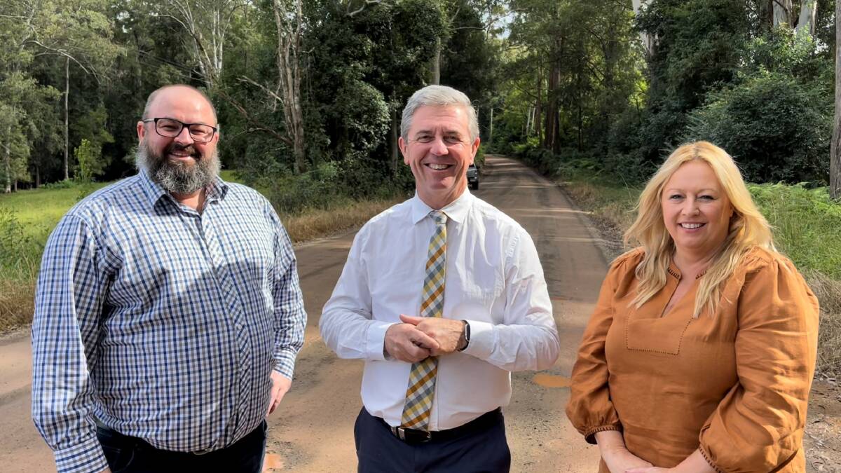 Deputy mayor Adam Roberts, Lyne MP Dr David Gillespie and mayor Peta Pinson recognise the importance of the Lorne Road sealing project. Photo supplied