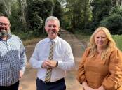 Deputy mayor Adam Roberts, Lyne MP Dr David Gillespie and mayor Peta Pinson recognise the importance of the Lorne Road sealing project. Photo supplied