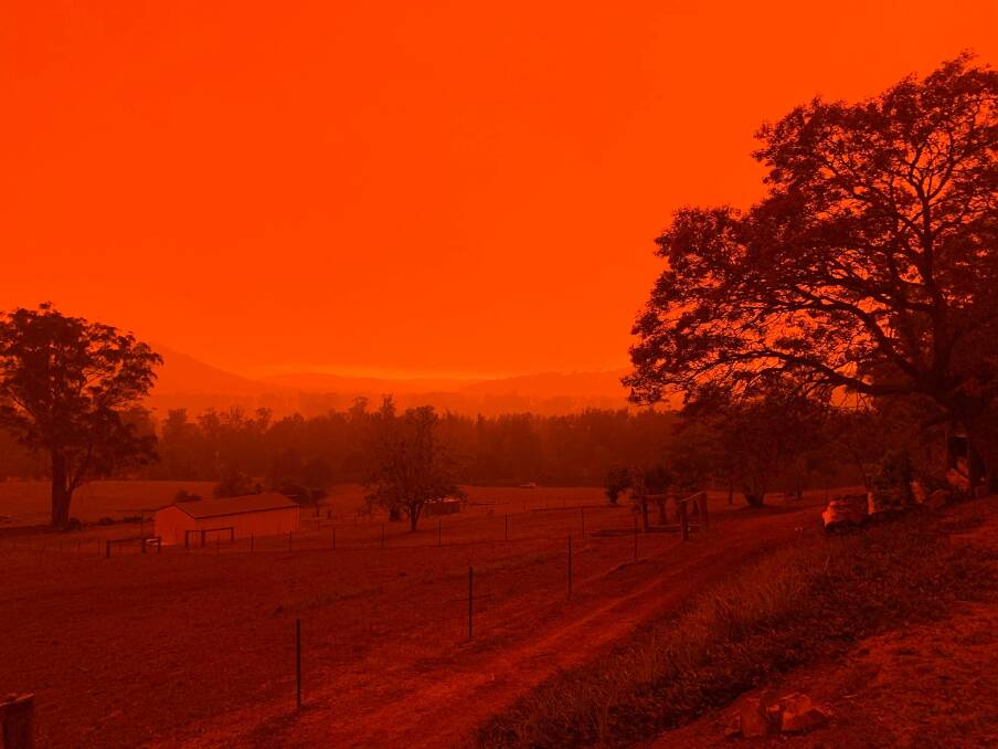 Red hue: Rollands Plains is bathed in an eerie red glow on Friday, November 8. Photo: Karen Lovett