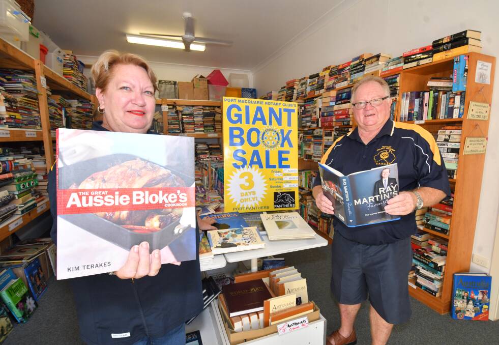 Major fundraiser: Elizabeth Fielding and Ray White prepare for the Giant Book Sale. Photo: Ivan Sajko