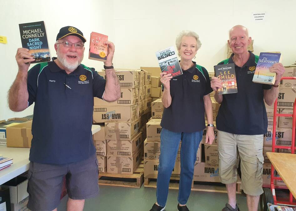 Books galore: Rotary Club of Port Macquarie member Kerry Medway, book store manager Valda Sturrock and Rotary Club of Port Macquarie book sale coordinator Bob Cleland get ready for the Spring Book Sale.