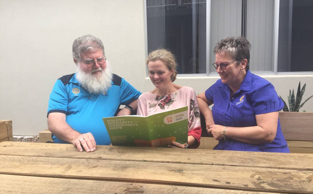 Raising awareness: Rotary Lodge chairman Phil Hafey, Can Assist executive director Emma Phillips and Rotary Lodge manager Paula Johnson in discussions at Rotary Lodge.