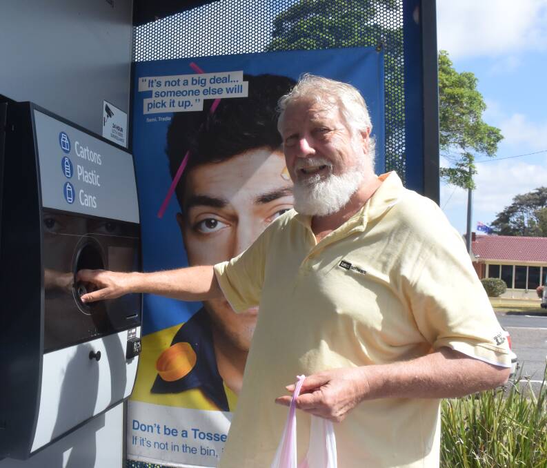 Scheme supporter: Hat Head resident Ken Powell uses the Return and Earn reverse vending machine at Growers Market Port Macquarie.