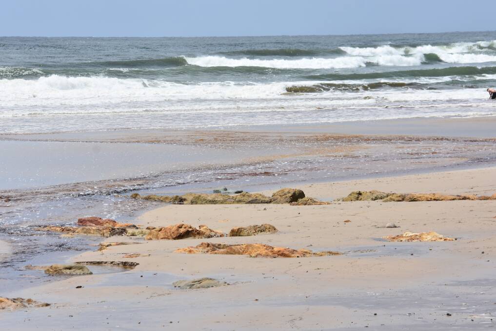 Concerns raised: Treated wastewater flows to meet the sea at Rainbow Beach in January.