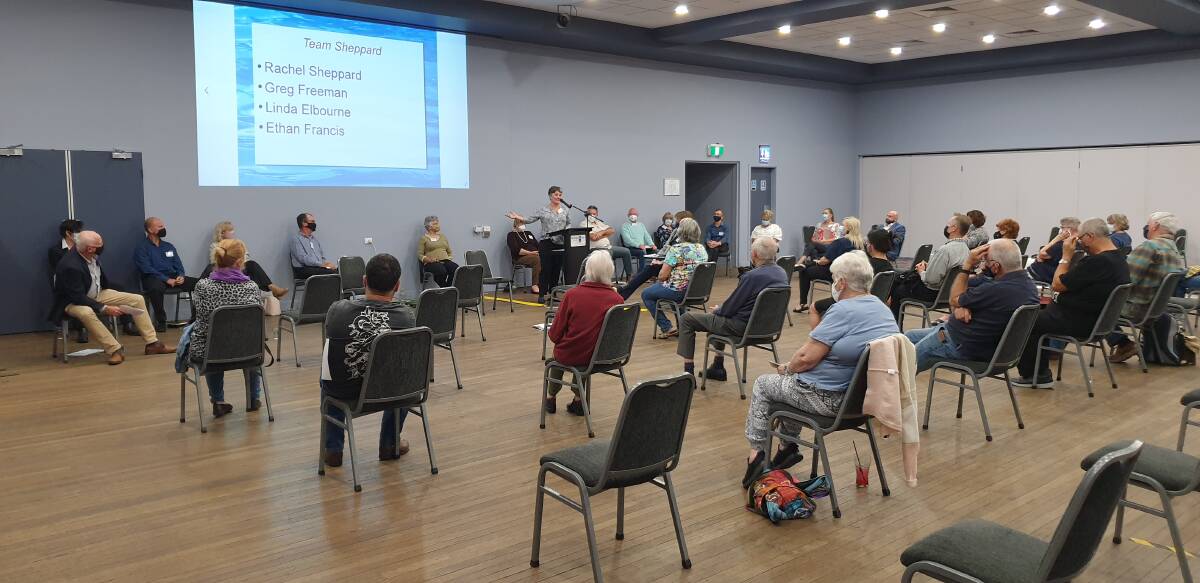 Opinions expressed: The audience listens to the candidates at the Wauchope community forum.