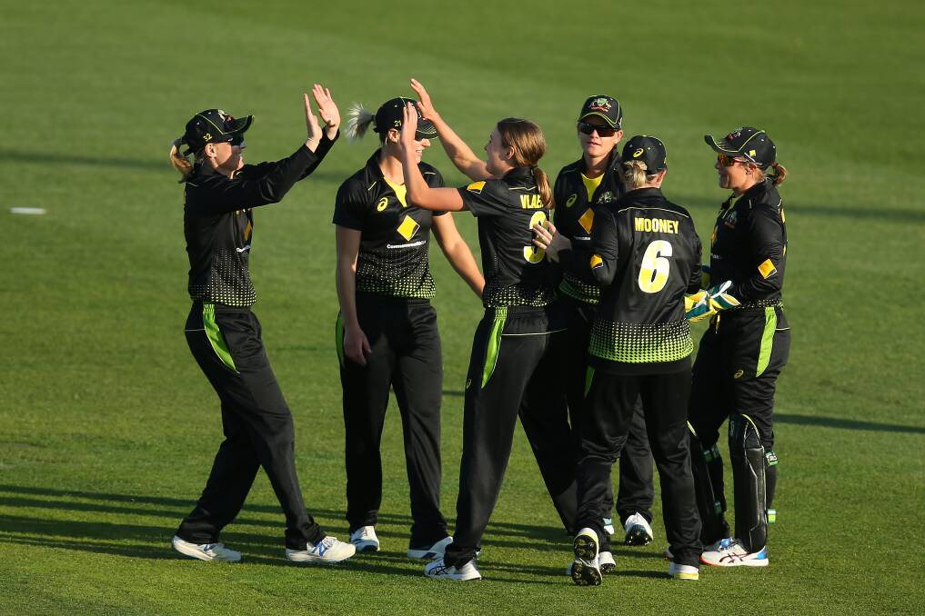 HIGH FIVE: Tayla Vlaeminck is congratulated by team-mates after she took the wicket of Sri Lankan number three Anushka Sanjeewani. Picture: GETTY IMAGES
