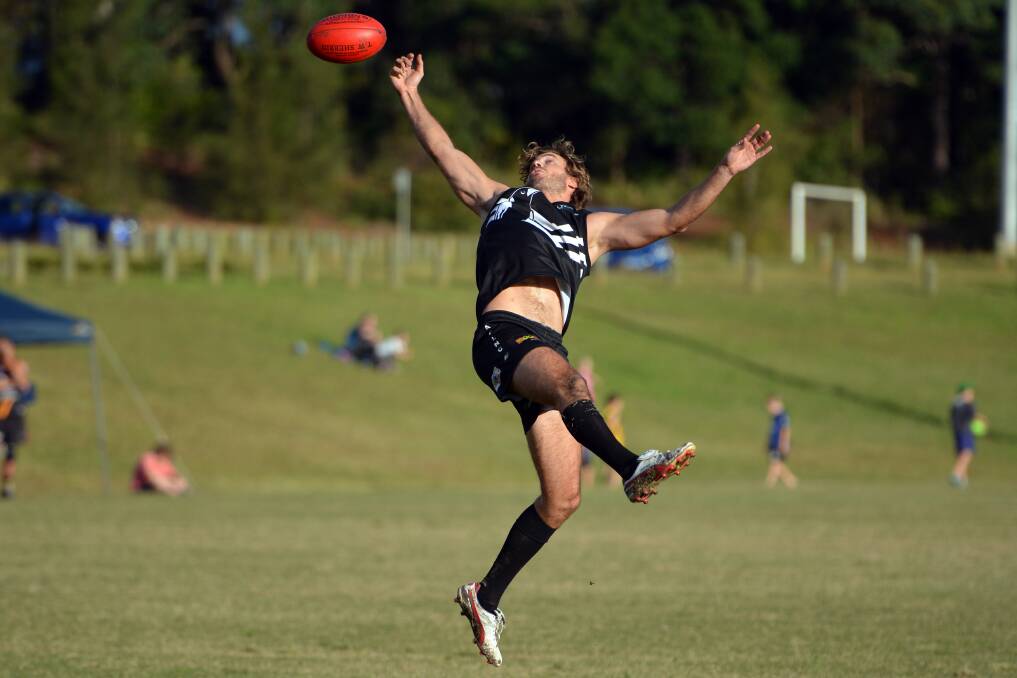 Leaping: Matthew James in action for the Port Macquarie Magpies on Saturday.