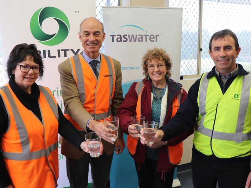 TasWater acting CEO Juliet Mercer (L) says Rossarden's water was undrinkable just a few years ago.
