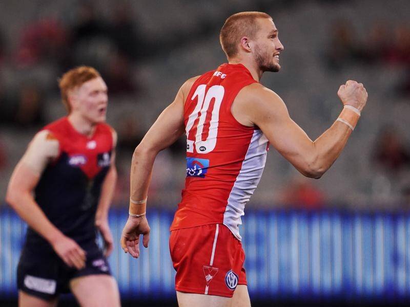Three Sam Reid first-half goals have led Sydney to a 53-point AFL victory over Melbourne at the MCG.