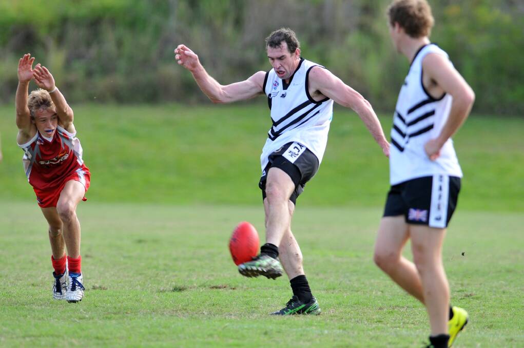 Jason Smith in action for the Magpies.