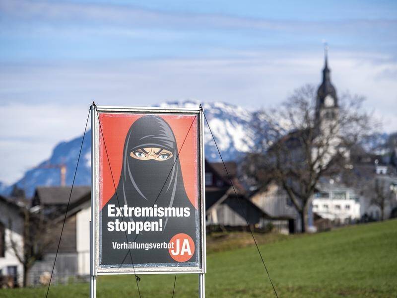 Swiss voters have passed a far-right proposal to ban facial coverings.