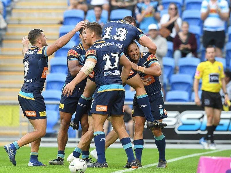 Gold Coast have smashed Newcastle 38-14, inflicting the Knights' fifth-straight NRL loss.