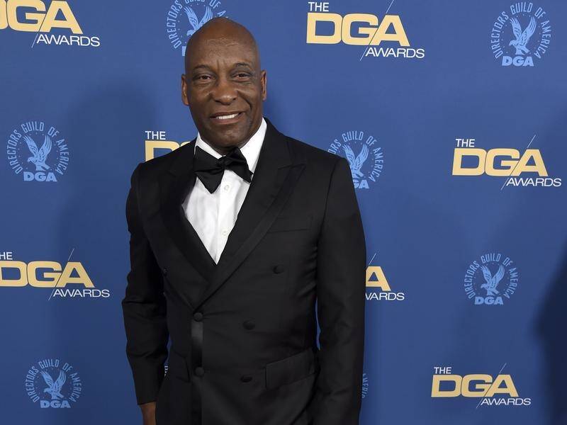 US film director John Singleton has suffered a stroke and is in intensive care, his family says.
