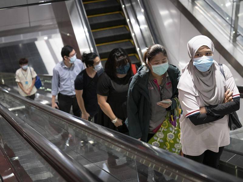 Thousands of people have joined morning peak as Malaysia eases coronavirus restrictions.