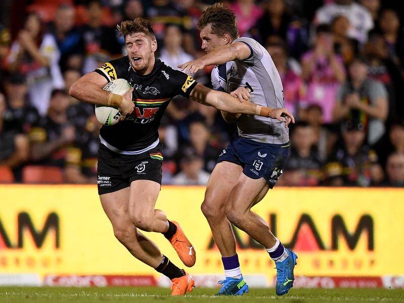 Penrith's Paul Momirovski (l) is facing a 2-3 week NRL ban for a dangerous tackle.