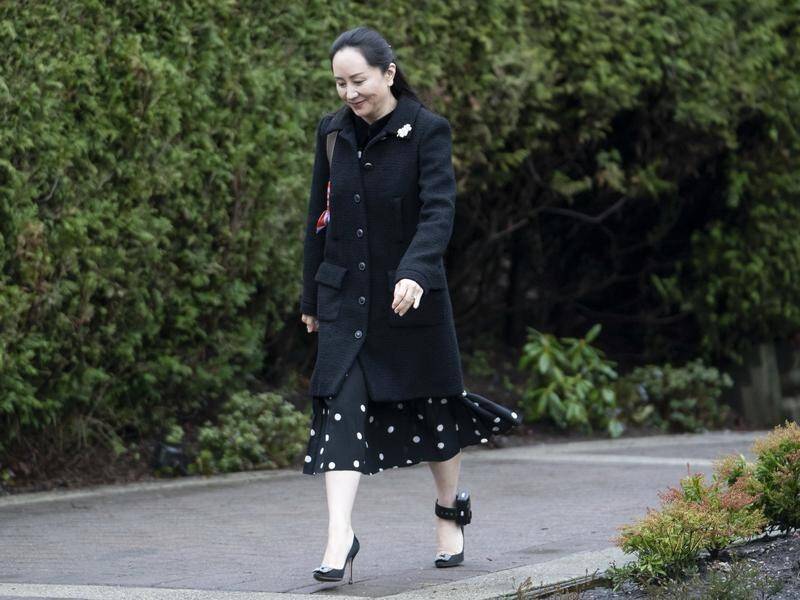 Huawei's Chief Financial Officer Meng Wanzhou leaves her Vancouver home to head to Court.