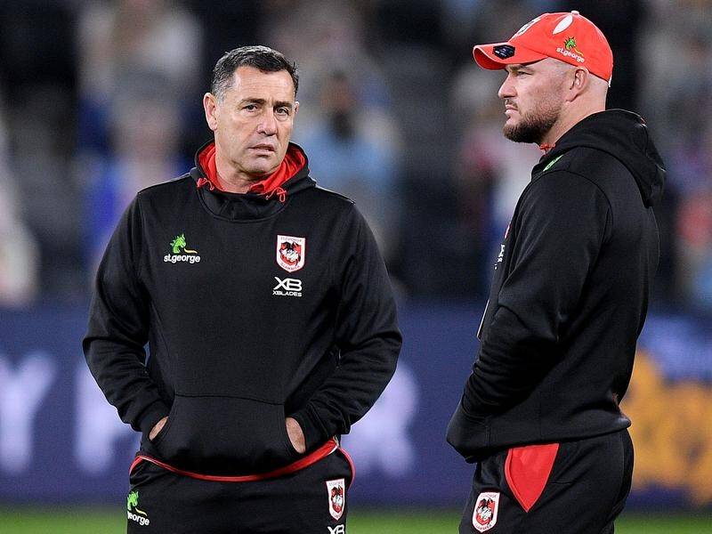 Dean Young (r) is weighing up his coaching options after losing out on the Dragons job.
