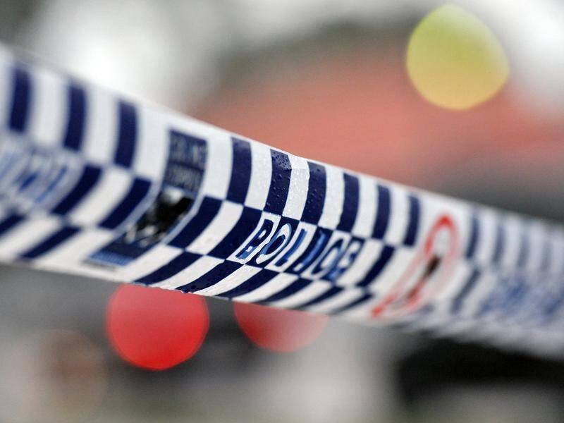 A woman is in police custody after the death of a baby boy in Sydney's southwest.