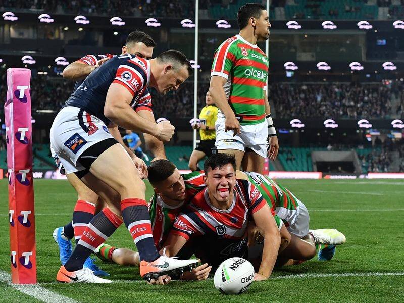 The Sydney Roosters' Joseph Manu outplayed his South Sydney counterpart James Roberts at the SCG.