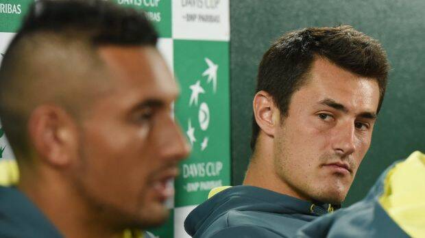 Different people: Nick Kyrgios (left) and Bernard Tomic. Photo: AAP
